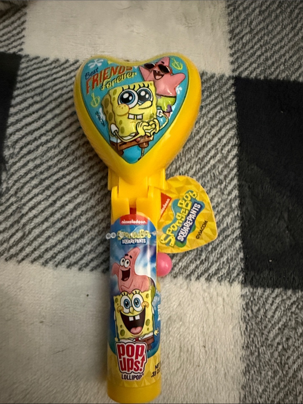 SpongeBob SquarePants Yellow Heart Pop-Up Lollipop Toy with Pink Accent